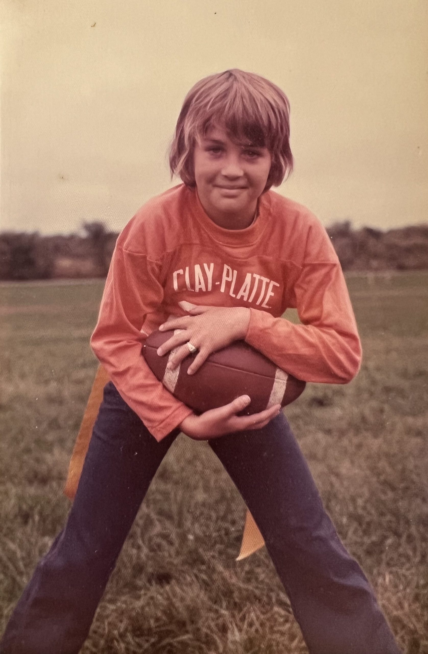 Childhood photo of Greg Westbrook from the Clay-Platte YMCA football program
