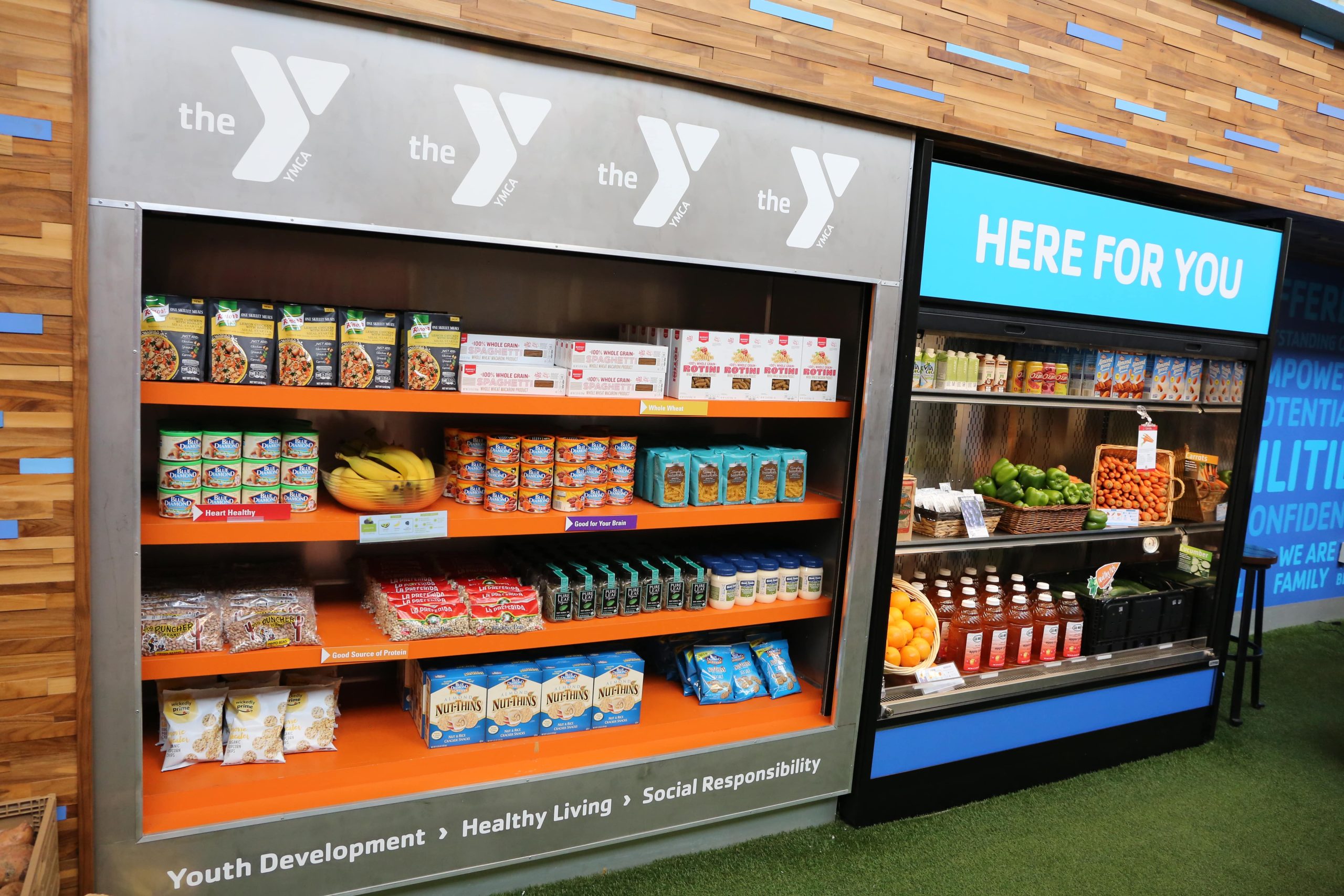 North Kansas City YMCA food pantry stocked with healthy crackers, nuts and fresh fruits.